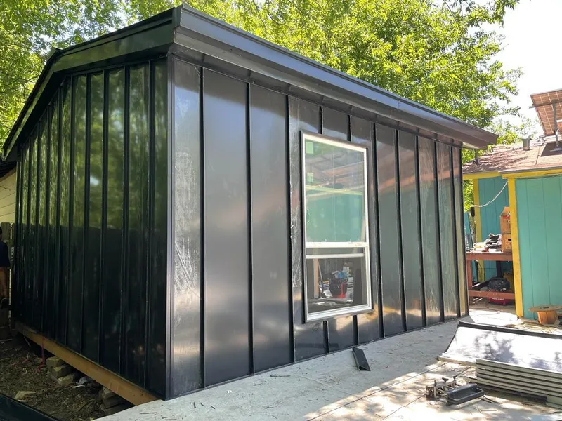 Black standing seam metal wall panels for Metal Roof Installation in Dade City